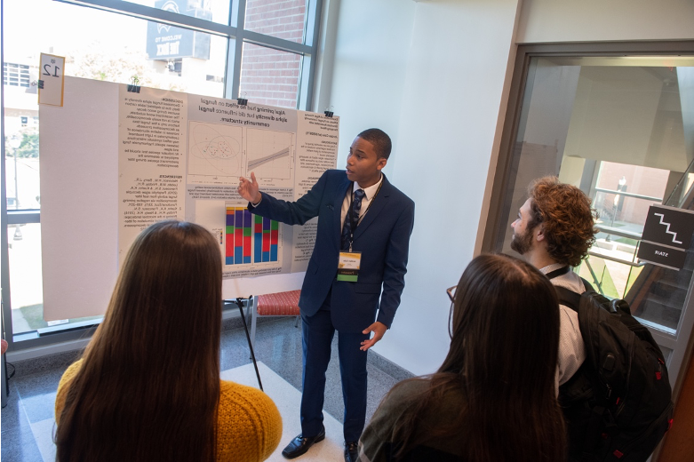 DCUR-winning student Jordan Cole presents his research project at UGS 2023.